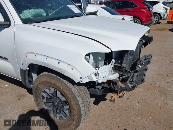 2023 Toyota Tacoma 4WD SR with VIN 3TMCZ5AN7PM653250, listed as a IAAI auction lot 41673534 with 19,496 mi miles. Bid and sale history available at carsss.com. Image 6.