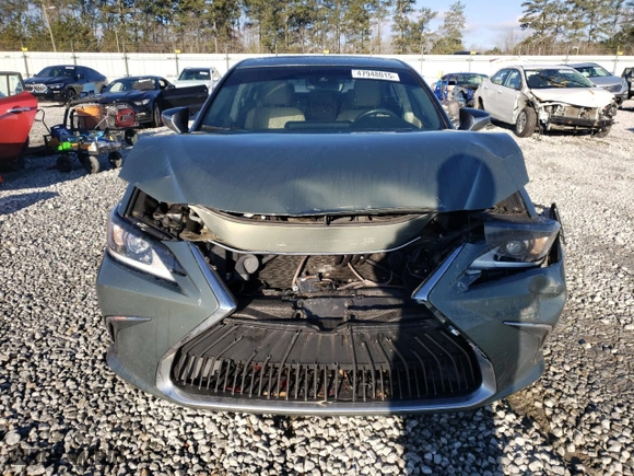 2019 Lexus ES with VIN 58ABZ1B11KU023085, listed as a Copart auction lot 47948015 with 70,676 mi miles and Salvage Title. Bid and sale history available at carsss.com. Image 5.