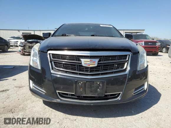 2016 Cadillac XTS Luxury Collection with VIN 2G61N5S37G9197536, listed as a Copart auction lot 52705785 with 143,434 mi miles and Salvage title. Bid and sale history available at DreamBid. Image 5.