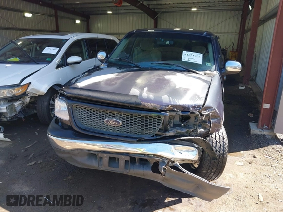2001 Ford F-150 XL with VIN 1FTRX17W61NC04079, listed as a IAAI auction lot 41821705 with 174,011 mi miles and . Bid and sale history available at DreamBid. Image 6.