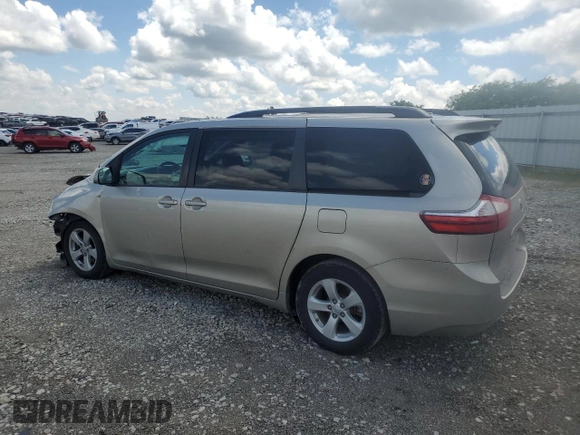 2015 Toyota Sienna LE AAS with VIN 5TDKK3DC8FS582699, listed as a Copart auction lot 56682415 with 195,915 mi miles and Salvage title. Bid and sale history available at DreamBid. Image 2.