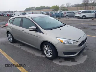 2015 Ford Focus SE with VIN 1FADP3K21FL211511, listed as a IAAI auction lot 42153828 with 126,111 mi miles. Bid and sale history available at carsss.com. Image 1.