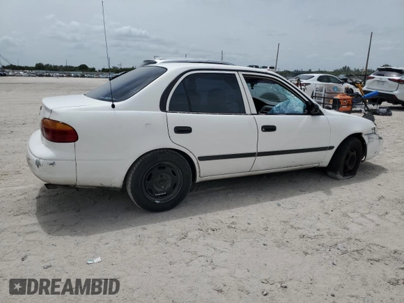2001 Chevrolet Prizm z VIN 1Y1SK52831Z428219, wystawiony jako Copart lot #59614015 z przebiegiem 242 375 mil mil oraz Szkoda całkowita • Salvage title. Historia ofert i sprzedaży dostępna na DreamBid. Obrazek 3.