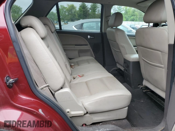 2008 Ford Taurus X SEL z VIN 1FMDK02W68GA43723, wystawiony jako Copart lot #56650305 z przebiegiem 279 439 mil mil oraz Czysty tytuł • Clean title. Historia ofert i sprzedaży dostępna na DreamBid. Obrazek 11.