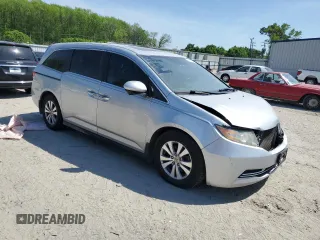 2015 Honda Odyssey EX-L with VIN 5FNRL5H66FB112090, listed as a Copart auction lot 52721475 with 120,472 mi miles and Salvage Title. Bid and sale history available at DreamBid. Image 4.