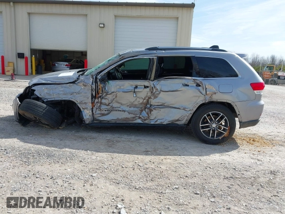 2017 Jeep Grand Cherokee Limited with VIN 1C4RJEBG5HC867724, listed as a IAAI auction lot 41749355 with 138,255 mi miles. Bid and sale history available at carsss.com. Image 14.