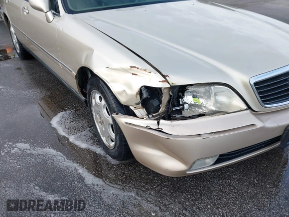 1999 Acura RL with VIN JH4KA9660XC007723, listed as a IAAI auction lot 42039719 with Not provided miles and . Bid and sale history available at DreamBid. Image 6.