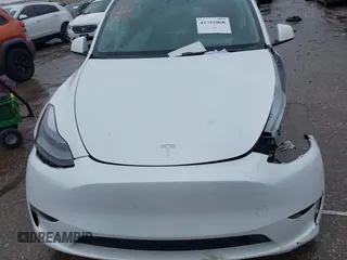2023 Tesla Model Y Performance with VIN 7SAYGDEF7PF807312, listed as a IAAI auction lot 41711068 with 25,029 mi miles and . Bid and sale history available at DreamBid. Image 10.