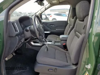 2022 Nissan Frontier Pro-4X with VIN 1N6ED1EK5NN691351, listed as a Copart auction lot 65206915 with 64,610 mi miles and Salvage title. Bid and sale history available at DreamBid. Image 7.