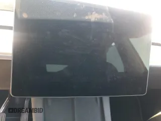 2022 Tesla Model Y Long Range z VIN 7SAYGDEE9NA014319, wystawiony jako Copart lot #53003555 z przebiegiem Nie podano mil oraz Szkody całkowita. Historia ofert i sprzedaży dostępna na DreamBid. Obrazek 9.