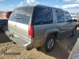 2000 Cadillac Escalade z VIN 1GYEK63R3YR218500, wystawiony jako Copart lot #77676354 z przebiegiem 164 602 mil mil oraz Tytuł czysty. Historia ofert i sprzedaży dostępna na DreamBid. Obrazek 3.