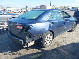 2014 Toyota Camry L with VIN 4T1BF1FK3EU820882, listed as a IAAI auction lot 42012278 with 174,000 mi miles and . Bid and sale history available at DreamBid. Image 4.