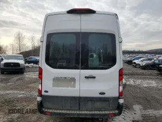 2021 Ford Transit Cargo с VIN 1FTBR3X84MKA93837, выставлен на аукционе Copart как лот 45632745 с пробегом 215 560 миль миль и Списание • Salvage title. История ставок и продаж доступна на DreamBid. Изображение 6.