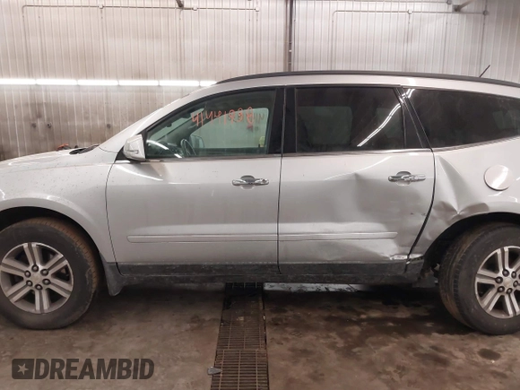 2015 Chevrolet Traverse LT with VIN 1GNKVHKD4FJ305990, listed as a IAAI auction lot 41441938 with 203,877 mi miles and . Bid and sale history available at DreamBid. Image 15.