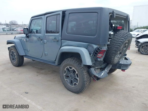 2015 Jeep Wrangler Unlimited Rubicon Hard Rock with VIN 1C4HJWFG1FL679873, listed as a IAAI auction lot 41508722 with 97,165 mi miles. Bid and sale history available at carsss.com. Image 3.