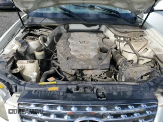 2005 Infiniti FX with VIN JNRAS08W75X218197, listed as a Copart auction lot 70484194 with 153,426 mi miles and Salvage Title. Bid and sale history available at DreamBid. Image 12.