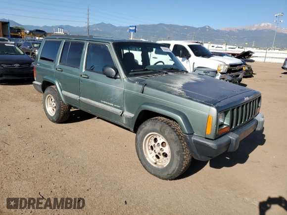 2000 Jeep Cherokee with VIN 1J4FF48S0YL198802, listed as a Copart auction lot 59996915 with 249,756 mi miles and Salvage title. Bid and sale history available at DreamBid. Image 4.