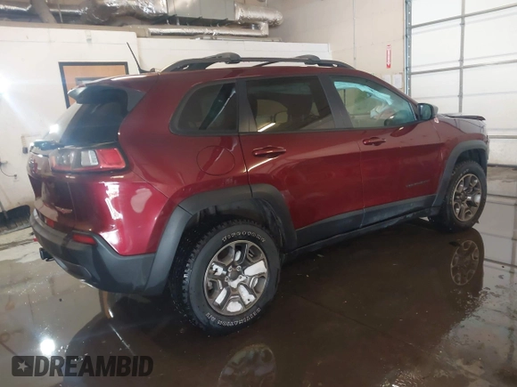 2021 Jeep Cherokee Trailhawk with VIN 1C4PJMBX4MD206997, listed as a IAAI auction lot 41565140 with Not provided miles and . Bid and sale history available at DreamBid. Image 4.
