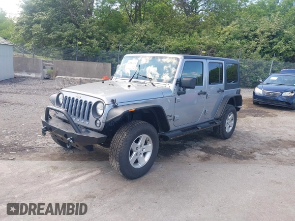 2014 Jeep Wrangler Unlimited Sport with VIN 1C4BJWDG6EL194359, listed as a IAAI auction lot 42182236 with 134,889 mi miles and . Bid and sale history available at DreamBid. Image 17.