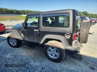 2012 Jeep Wrangler Sport with VIN 1C4AJWAG5CL273292, listed as a Copart auction lot 60135395 with 123,874 mi miles and Salvage title. Bid and sale history available at DreamBid. Image 2.