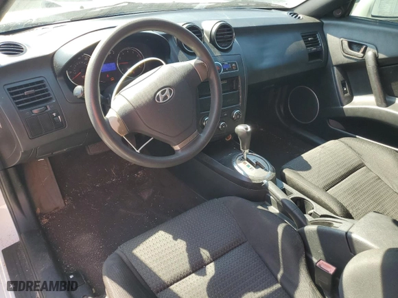 2007 Hyundai Tiburon GS with VIN KMHHM66D67U248918, listed as a Copart auction lot 77618184 with 145,703 mi miles and Salvage Title. Bid and sale history available at carsss.com. Image 8.