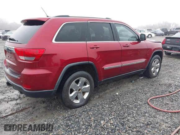 2013 Jeep Grand Cherokee Laredo with VIN 1C4RJEAG0DC516926, listed as a IAAI auction lot 41800254 with 259,006 mi miles. Bid and sale history available at carsss.com. Image 4.