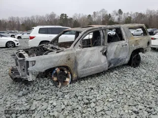 2015 Chevrolet Suburban LTZ with VIN 1GNSKKKC5FR689728, listed as a Copart auction lot 48615945 with 0 mi miles and Salvage Title. Bid and sale history available at carsss.com. Image 1.