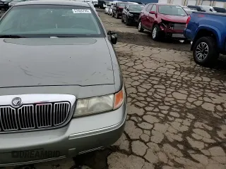 2000 Mercury Grand Marquis LS z VIN 2MEFM75WXYX742065, wystawiony jako Copart lot #57655795 z przebiegiem 175 070 mil mil oraz Tytuł czysty. Historia ofert i sprzedaży dostępna na DreamBid. Obrazek 13.