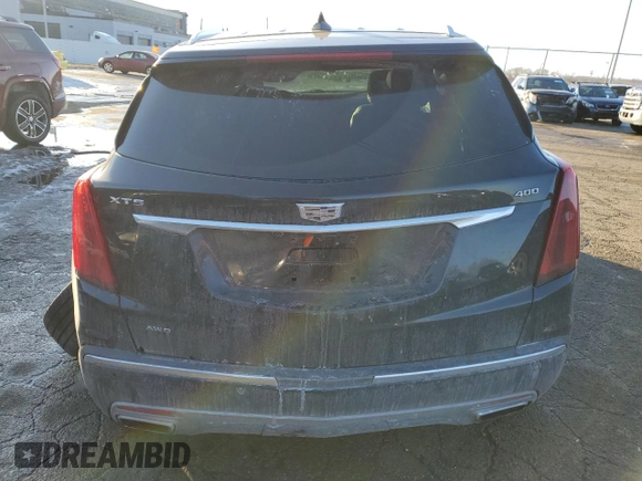 2021 Cadillac XT5 AWD Premium Luxury with VIN 1GYKNDRS6MZ111640, listed as a Copart auction lot 46567035 with 57,484 mi miles and Salvage Title. Bid and sale history available at DreamBid. Image 6.