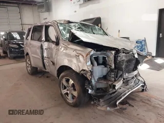 2014 Honda Pilot EX-L with VIN 5FNYF3H56EB024735, listed as a IAAI auction lot 41286284 with 101,221 mi miles. Bid and sale history available at carsss.com. Image 1.