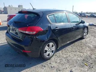 2016 Kia Forte 5-Door LX with VIN KNAFK5A86G5597042, listed as a IAAI auction lot 42032937 with 145,137 mi miles. Bid and sale history available at carsss.com. Image 4.