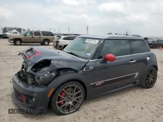 2013 MINI Hardtop John Cooper Works with VIN WMWSU9C57DT722317, listed as a Copart auction lot 55922274 with 61,195 mi miles and Salvage title. Bid and sale history available at DreamBid. Image 1.