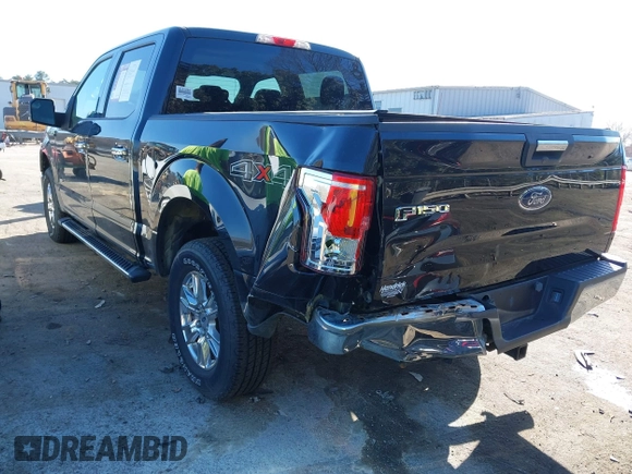2015 Ford F-150 XLT with VIN 1FTEW1EG6FKF22211, listed as a IAAI auction lot 41753438 with 130,019 mi miles. Bid and sale history available at carsss.com. Image 3.
