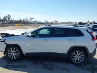 2016 Jeep Cherokee High Altitude with VIN 1C4PJLDB1GW264358, listed as a IAAI auction lot 41884632 with 87,250 mi miles. Bid and sale history available at carsss.com. Image 14.