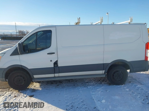 2015 Ford Transit Cargo with VIN 1FTNR1ZM0FKA78069, listed as a IAAI auction lot 41396797 with 96,001 mi miles and . Bid and sale history available at DreamBid. Image 14.