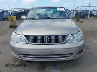2001 Toyota Avalon XL w/Bucket Seats with VIN 4T1BF28B61U185881, listed as a IAAI auction lot 42138345 with 242,195 mi miles. Bid and sale history available at carsss.com. Image 6.