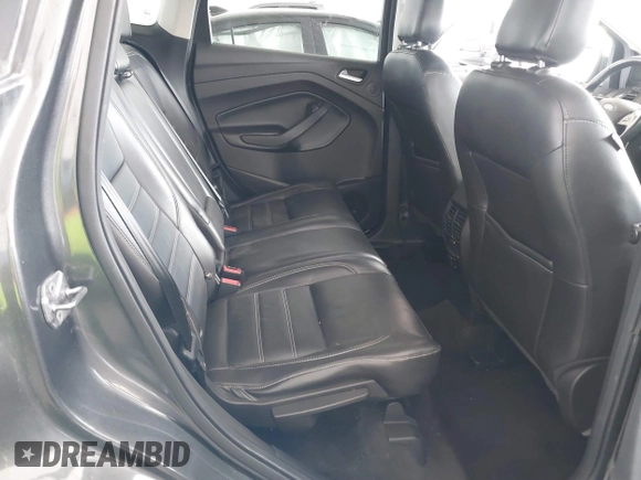 2018 Ford Escape Titanium with VIN 1FMCU0J98JUA03474, listed as a IAAI auction lot 37677880 with 106,423 mi miles and . Bid and sale history available at DreamBid. Image 8.