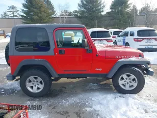 2005 Jeep Wrangler Rubicon with VIN 1J4FA69S25P316085, listed as a IAAI auction lot 41503034 with 57,252 mi miles. Bid and sale history available at carsss.com. Image 13.