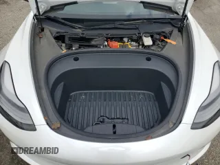 2021 Tesla Model 3 Standard Range Plus with VIN 5YJ3E1EA7MF087909, listed as a Copart auction lot 50942395 with 16,591 mi miles and Salvage Title. Bid and sale history available at carsss.com. Image 12.