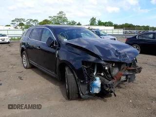 2015 Lincoln MKT with VIN 2LMHJ5NK8FBL03512, listed as a Copart auction lot 76657954 with 324,728 mi miles and Non Repairable. Bid and sale history available at carsss.com. Image 1.