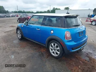 2010 MINI Hardtop S with VIN WMWMF7C55ATW88946, listed as a IAAI auction lot 42443200 with 104,953 mi miles and . Bid and sale history available at DreamBid. Image 3.
