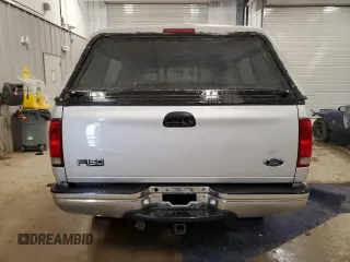 1999 Ford F-150 with VIN 1FTRX18W2XKB01444, listed as a Copart auction lot 52717195 with 210,581 mi miles and Clean title. Bid and sale history available at DreamBid. Image 6.
