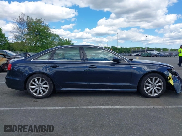 2013 Audi A6 Prestige z VIN WAUJGAFC6DN005023, wystawiony jako IAAI lot #42201985 z przebiegiem 80 337 mil mil oraz . Historia ofert i sprzedaży dostępna na DreamBid. Obrazek 13.