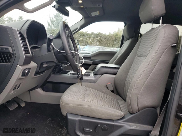 2019 Ford F-150 XL with VIN 1FTEW1E45KFD09825, listed as a Copart auction lot 52302845 with 50,751 mi miles and Salvage Title. Bid and sale history available at carsss.com. Image 7.