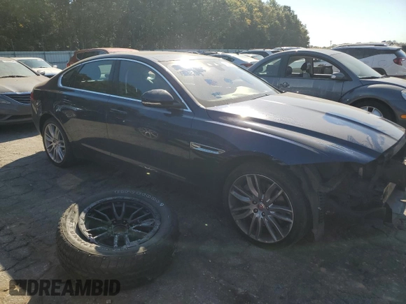 2016 Jaguar XF 35t Prestige with VIN SAJBK4BV6GCY17003, listed as a Copart auction lot 76336784 with 105,686 mi miles and Salvage Title. Bid and sale history available at carsss.com. Image 4.