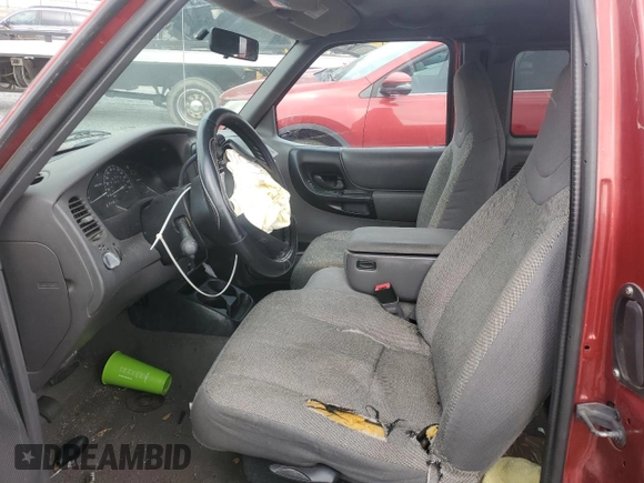 2000 Ford Ranger XL with VIN 1FTZR15V1YTB05504, listed as a Copart auction lot 47763485 with 211,756 mi miles and Salvage Title. Bid and sale history available at DreamBid. Image 7.