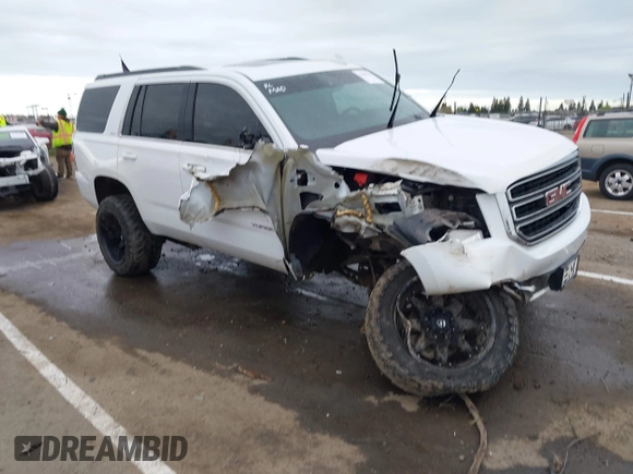 2019 GMC Yukon SLT with VIN 1GKS2BKC1KR167766, listed as a IAAI auction lot 41902532 with 97,793 mi miles. Bid and sale history available at carsss.com. Image 1.