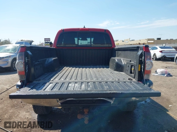 2014 Toyota Tacoma with VIN 5TFUU4EN7EX084785, listed as a IAAI auction lot 41879329 with 133,216 mi miles and . Bid and sale history available at DreamBid. Image 16.