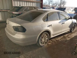 2014 Volkswagen Passat Wolfsburg Edition with VIN 1VWAS7A31EC091234, listed as a IAAI auction lot 41801788 with Not provided miles and . Bid and sale history available at DreamBid. Image 4.