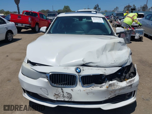 2014 BMW 3 Series 328i with VIN WBA3A5G55ENP31569, listed as a IAAI auction lot 42218428 with 151,927 mi miles and . Bid and sale history available at DreamBid. Image 12.